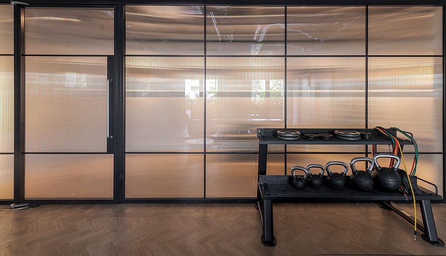 architecture photography, apartment building, London, gym area, fitness space, glass wall
