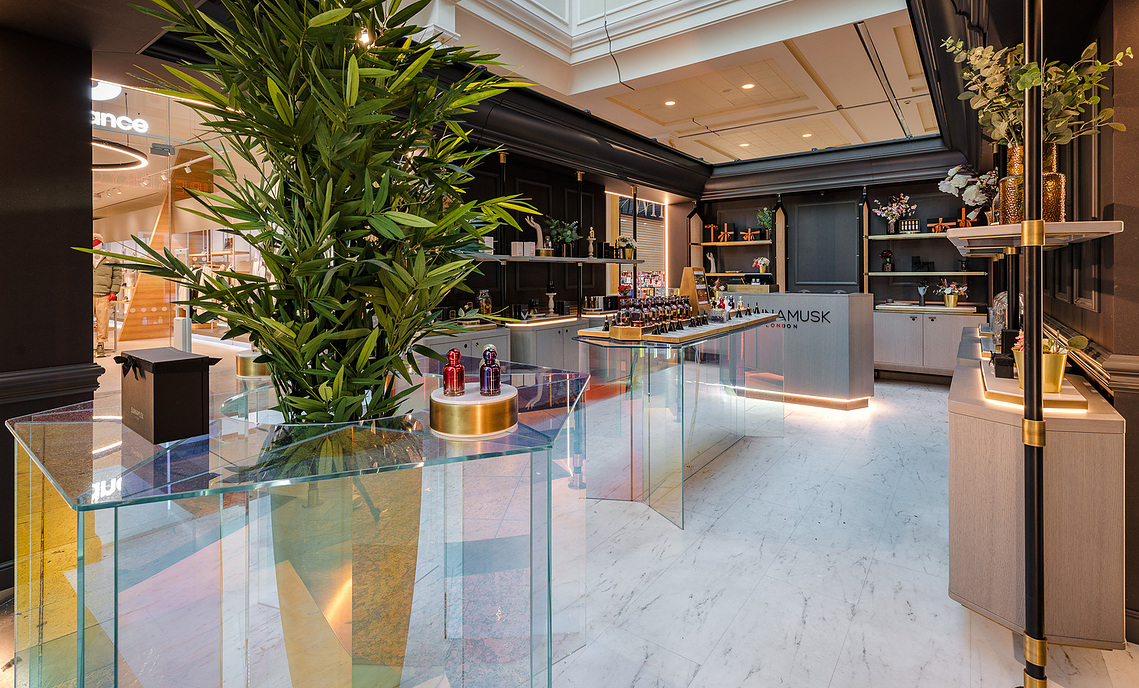 high end fragrance kiosk in situ in manchester Trafford Centre, shows interior with displays of products