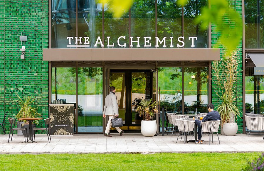 london lifestyle photography, shot of restaurant from outside with person walking in