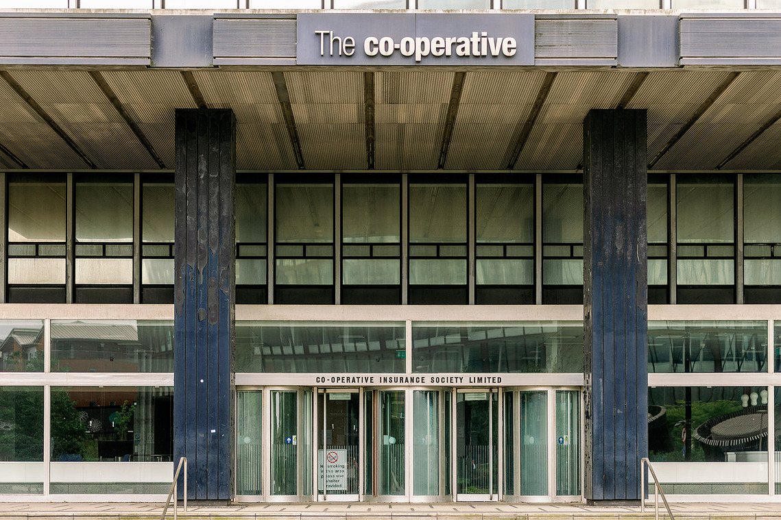 Original but worn out CIS Building façade and entrance