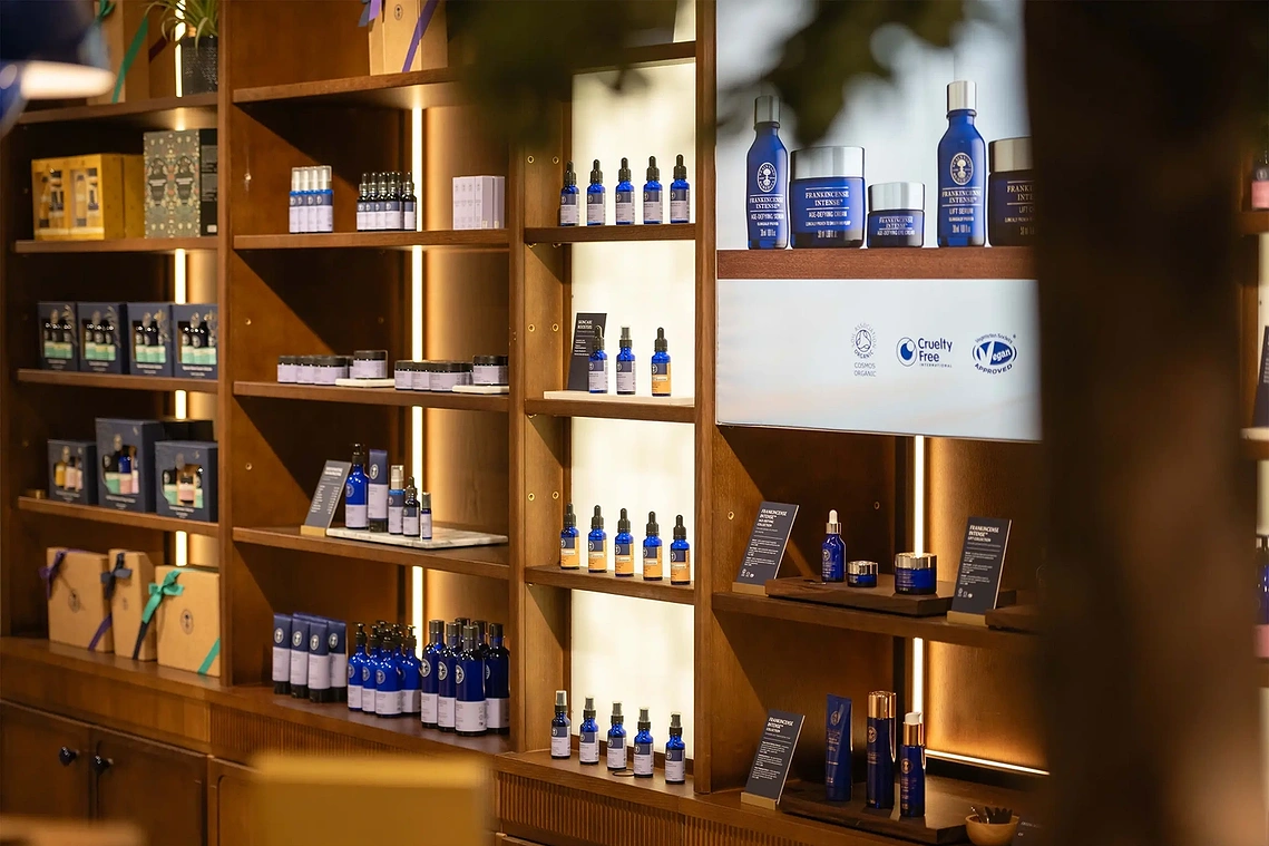 Close up architectural detail photography of custom merchandise shelving and apothecary wall.