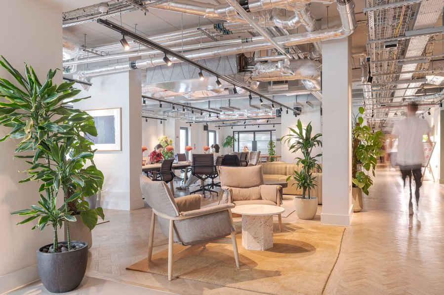architecture photography, apartment building, London, open plan communal reception area with person walking
