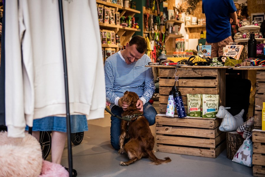 Placemaking and lifestyle photography,
Leisure and hospitality destination,
Pet shop, with owner and a dog