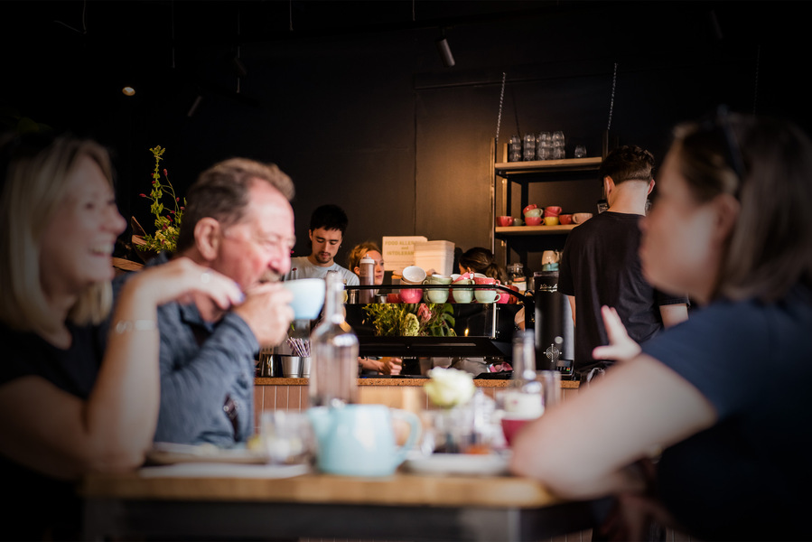Placemaking and lifestyle photography,
Leisure and hospitality destination,
Customers sat inside cafe