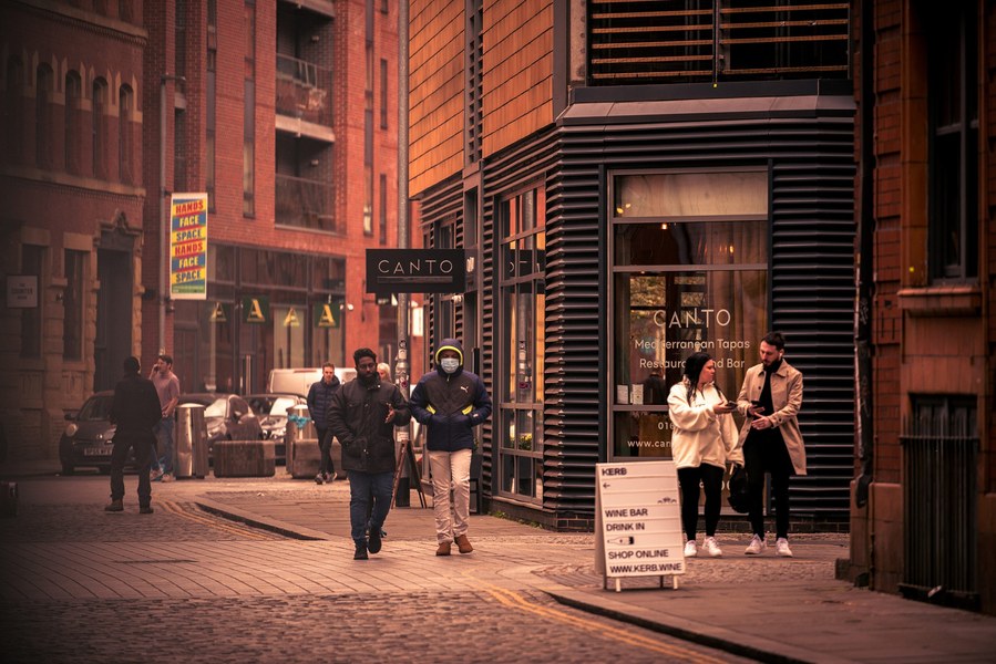 placemaking photography. manchester. norther quarter. architecture. people walking in Ancoats 