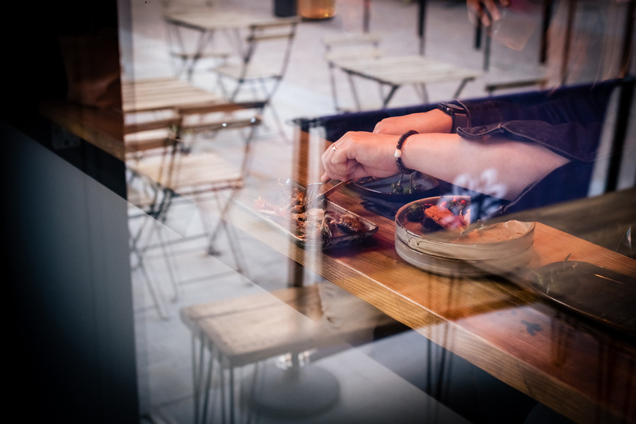 Placemaking and lifestyle photography,
Leisure and hospitality destination,
diners visible through a window