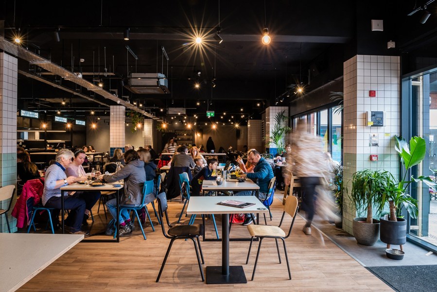 Placemaking and lifestyle photography,
Leisure and hospitality destination,
Customers sat inside cafe