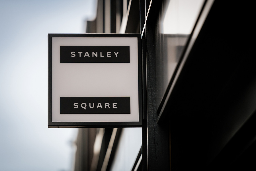 Placemaking and lifestyle photography,
Leisure and hospitality destination,
box sign on wall