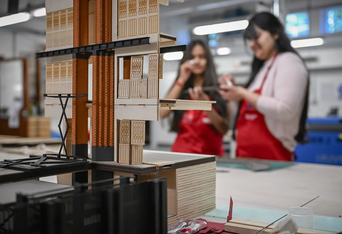 Students making models and demonstrating creative experimentation within the MSA studios.