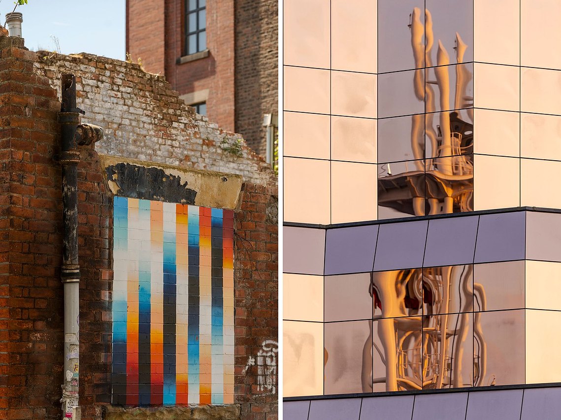 architecture and lifestyle photography, old red brick building on left with modern art poster and on right shows a factory reflected in a modern glass building exterior 