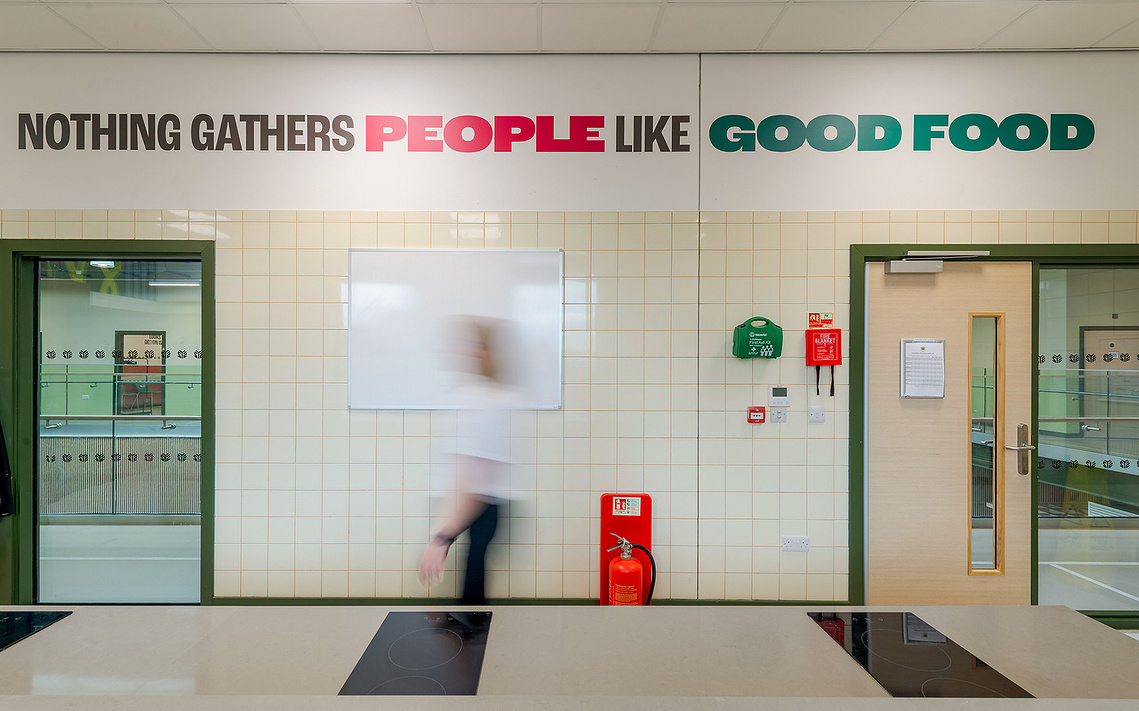 Environmental graphics photography showing large scale vibrant vinyl designs by Jane Bowyer inside a commercial space
