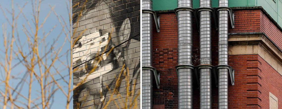 diptych of two street scenes, street art of man with camera and industrial air ducts on outside of red brick building. both manchester scenes
