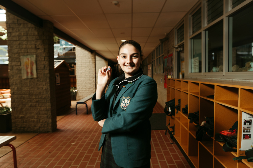 Junior Canberra Girls Grammar Shool Student Anatasia Maleganea has won an ACT Children's Week award by creating badges that show a person's country of origin. Picture: Dion Georgopoulos - THE CANBERRA TIMES, ACM