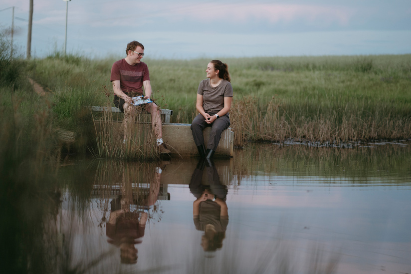 ANU students Isabella Howard, and William Jaggers frog watching at the Macgregor Wetlands. Picture: Dion Georgopoulos - THE CANBERRA TIMES, ACM