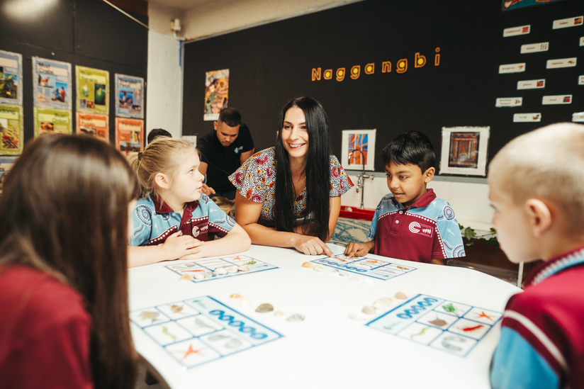 Revival of indigenous languages in schools. Executive Principal Nicole Wade with students Kaidynce Newman-Riedl, and Keshav Singh at Curran Public School inside their indigenous language room where they teach Dharawal, Thursday 19th of October 2023. Photo