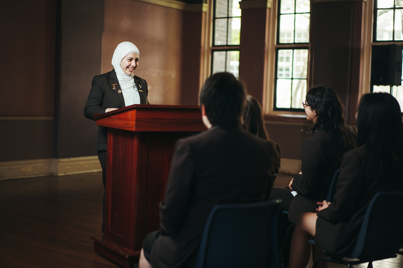 Sydney Girls High school students who are apart of the debating team speaker Anhaar Kareem with team mates listening Miriam Stubbs-Goulston, Melissa Liu, Sofia Malik, and Sofia Tzarimas, at Sydney Girls High school, Friday 11th of August 2023. Photo: Dion