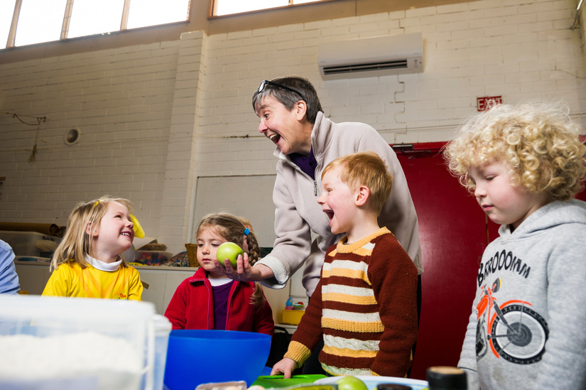 German Australian playschool has received an exception and is now able to access childcare subsidies. Director Lisa Stephan teaching the kids how to bake. Photo: Dion Georgopoulos