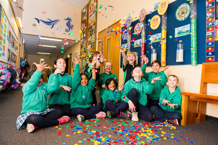 Kaleen Primary School students (back row) Lila Sit, Alexis Cofinas, Sienna Flahive, Makensey Day, James Orea, (front row) Aiza Durrani, Abhigna Dudaga, Aneera Islam, Paige Galbraith, and Jayden Kelly with positive behaviour tokens. Picture: Dion Georgopo