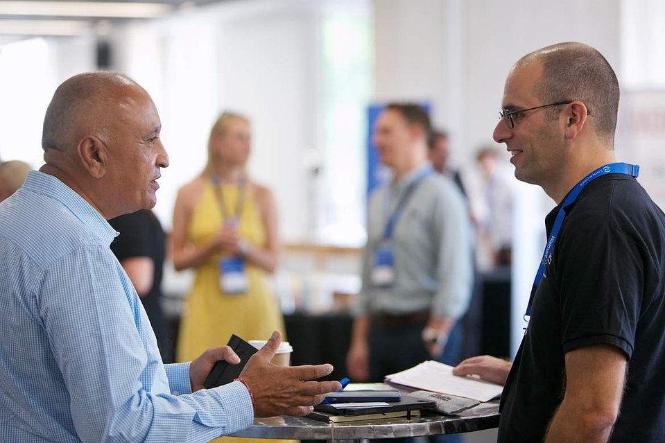 Delegates networking at corporate conference