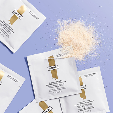 advertising product photography of haircare powder packet for DP Hue