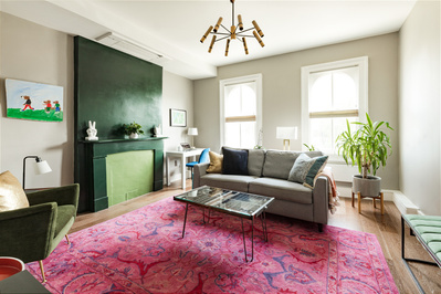 Interior design photography with natural light and bright pink rug