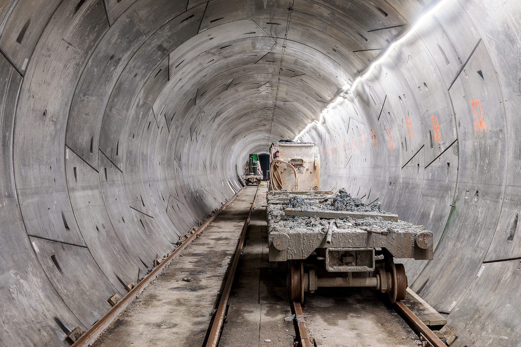 train car underground drain with muck silt mud