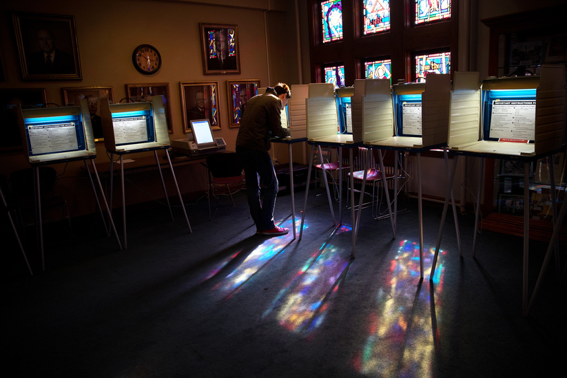 Sam Nobbs, 24, votes at the Dundee Presbyterian Church at the intersection of Underwood Ave. and Happy Hollow Blvd., in Omaha, Neb., on Tuesday, Nov. 8th, 2016. MEGAN FARMER/THE WORLD-HERALD