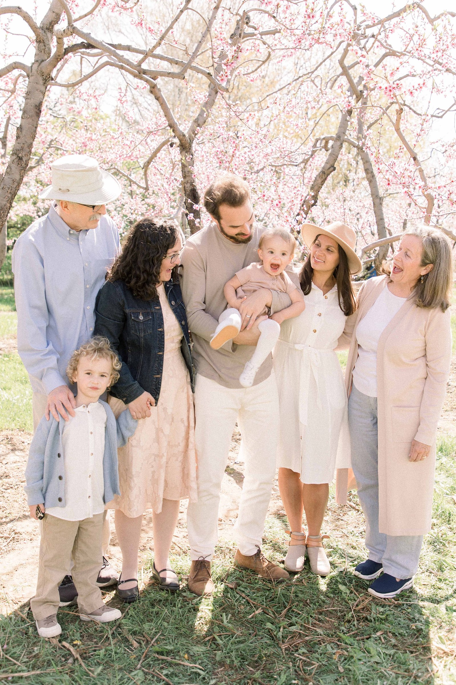 Extended family photo taken in an orchard. Spring Session. Family Photography. Niagara Family Photography, Niagara Portrait Photographer. Jordan, Ontario. Emily VanderBeek Photography.