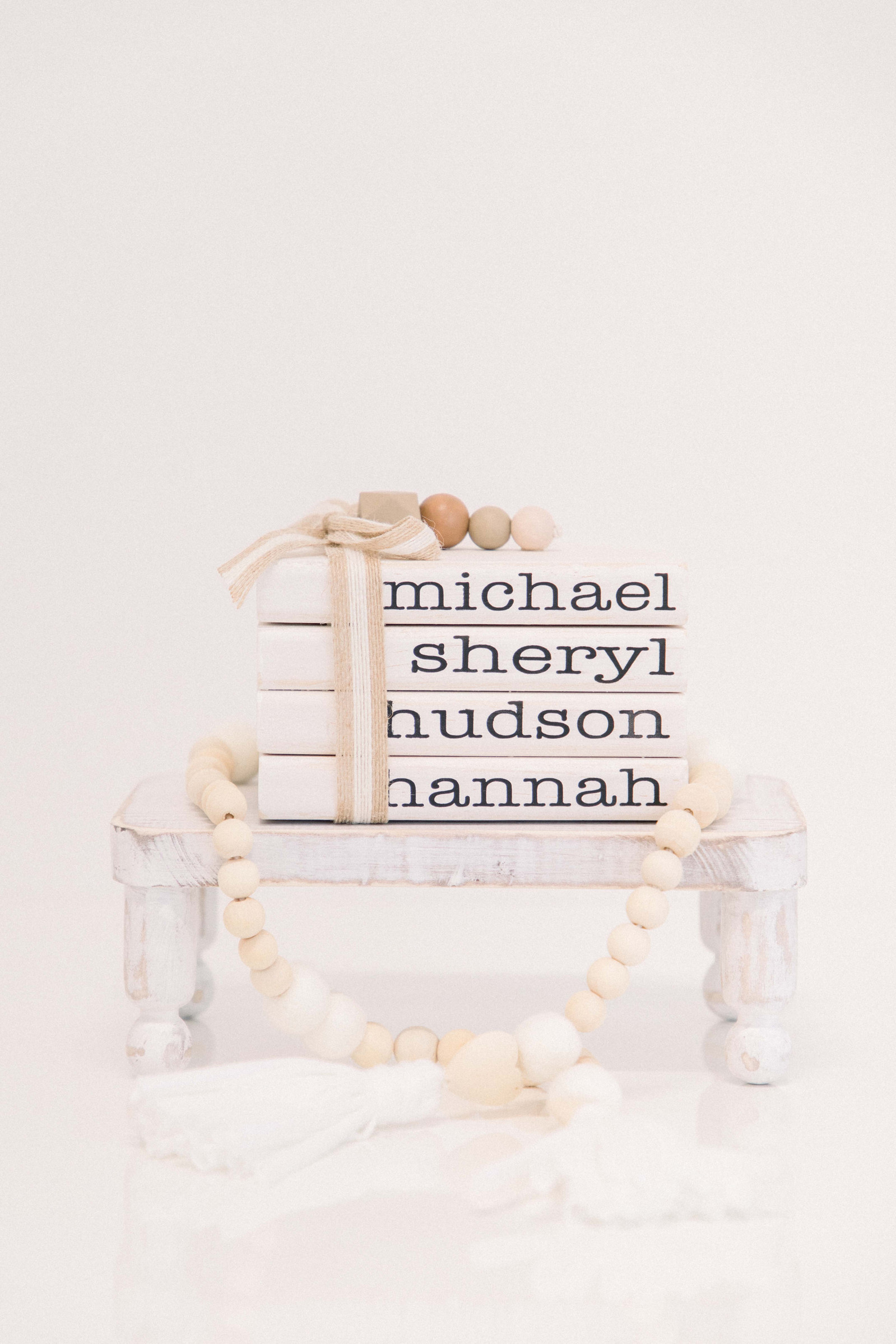 Product photo of handmade wooden shelf with handmade books sitting on it. Emily VanderBeek Photography, branding photography, portrait photography, Niagara portrait photographer, Niagara branding photographer.