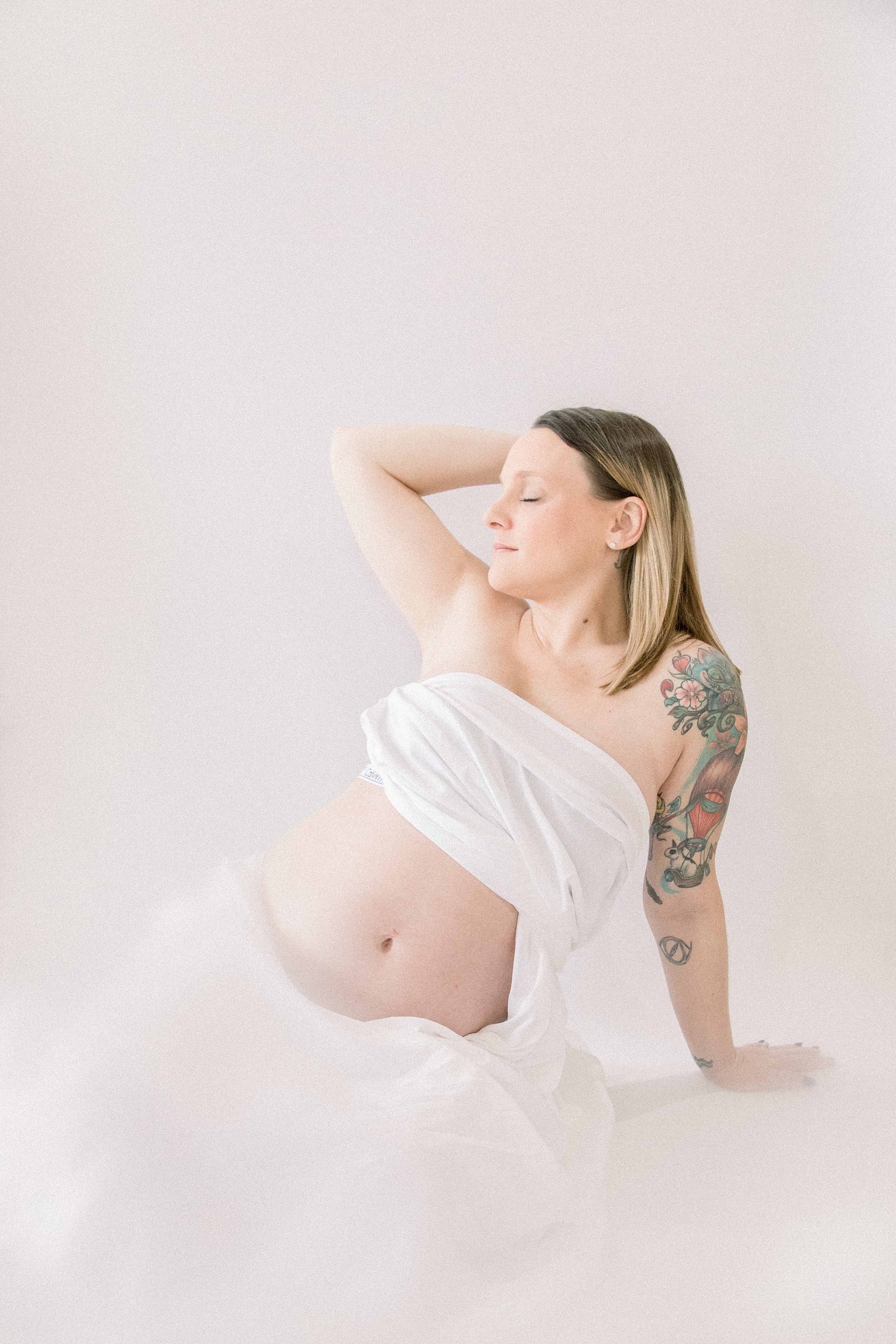 Studio portrait of a pregnant mother. Ottawa Maternity Photographer, Montreal Maternity Photographer, Motherhood Photography, Authentic Photography, Light & Airy Photography, Emily VanderBeek Photography.