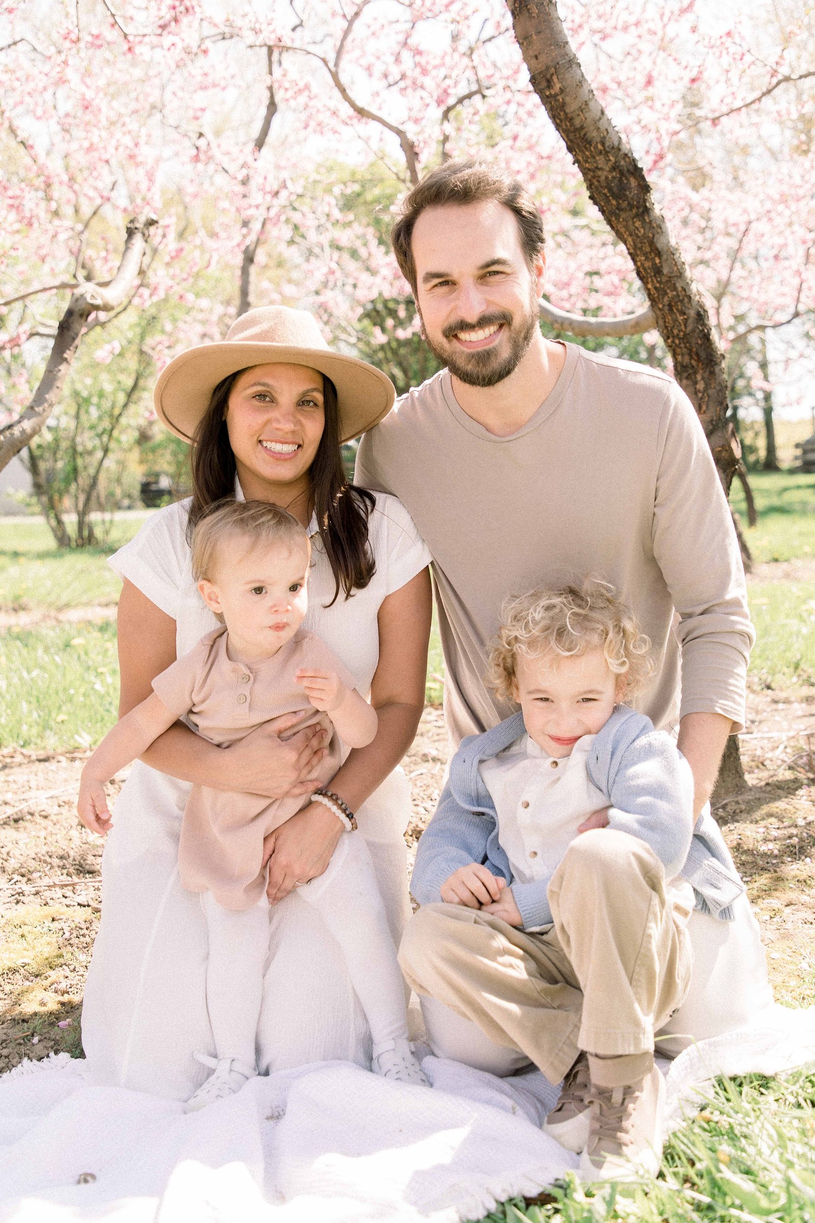 Extended family photo taken in an orchard. Spring Session. Family Photography. Niagara Family Photography, Niagara Portrait Photographer. Jordan, Ontario. Emily VanderBeek Photography.