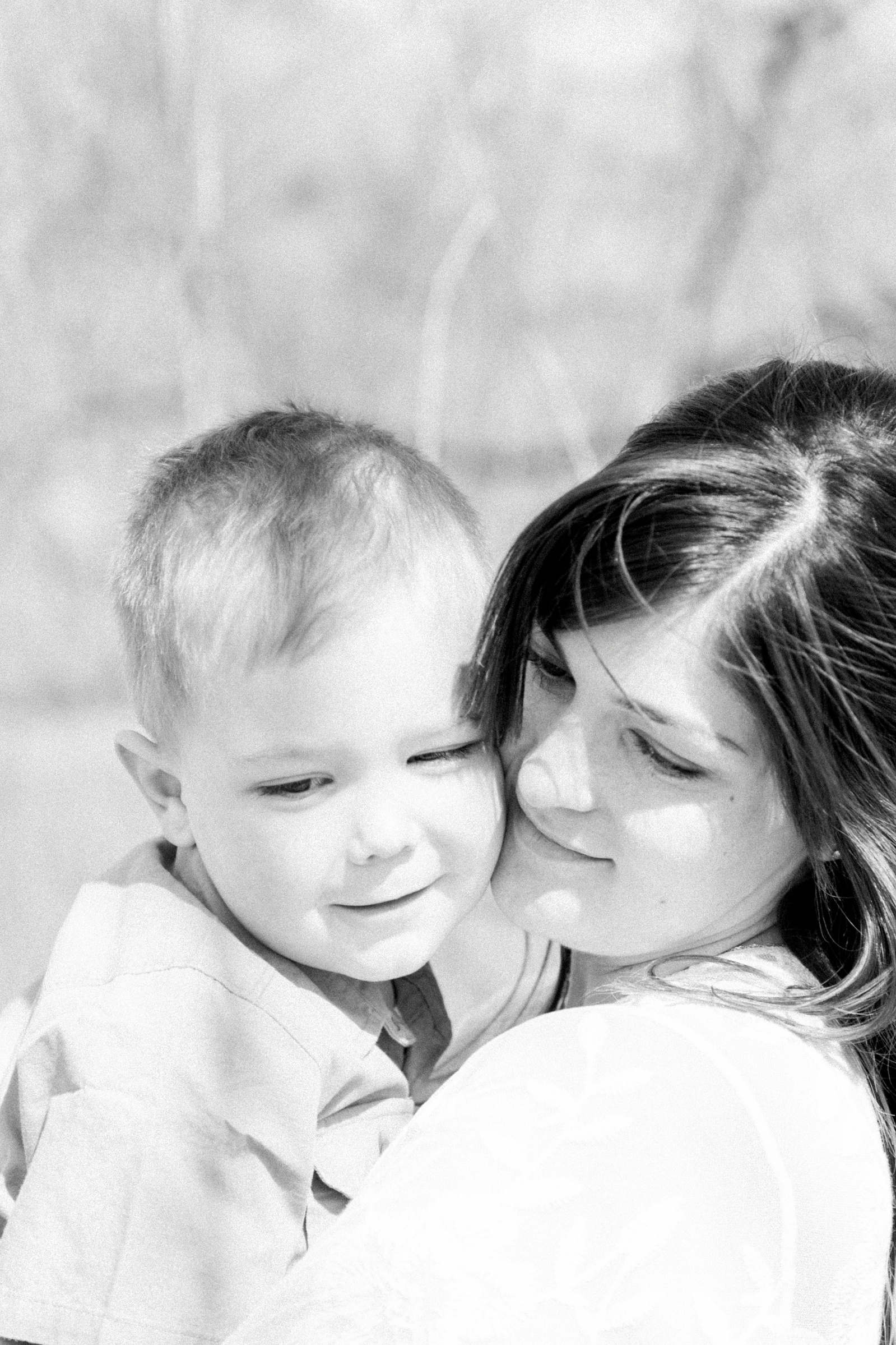 Black and white portrait of a mother and son hugging, Niagara maternity photography, Niagara family photography, park photo session