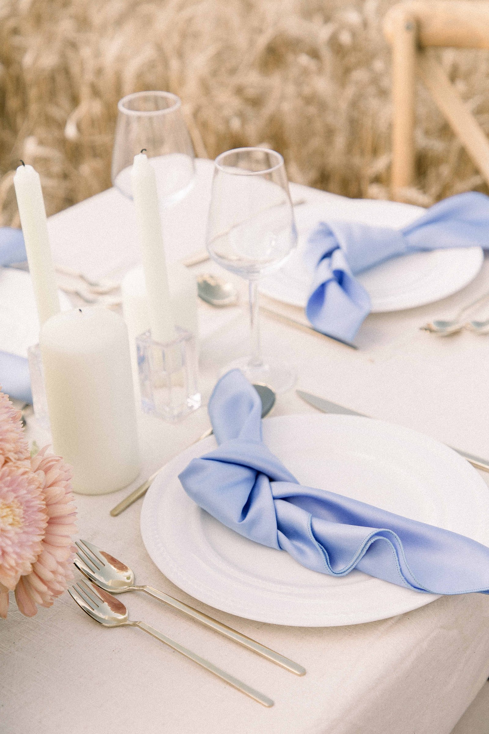 Photo of a table setting in a wheat field in Rigaud, Quebec. Emily VanderBeek Photography. Montreal Photographer. Light & Airy photographer.