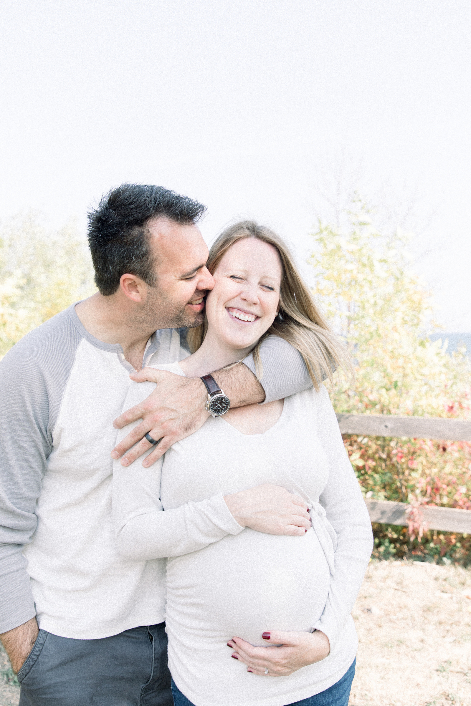 Portrait of husband hugging expecting wife, Niagara portrait photographer, Niagara family photographer, Niagara maternity photographer, maternity photography, candid photography.