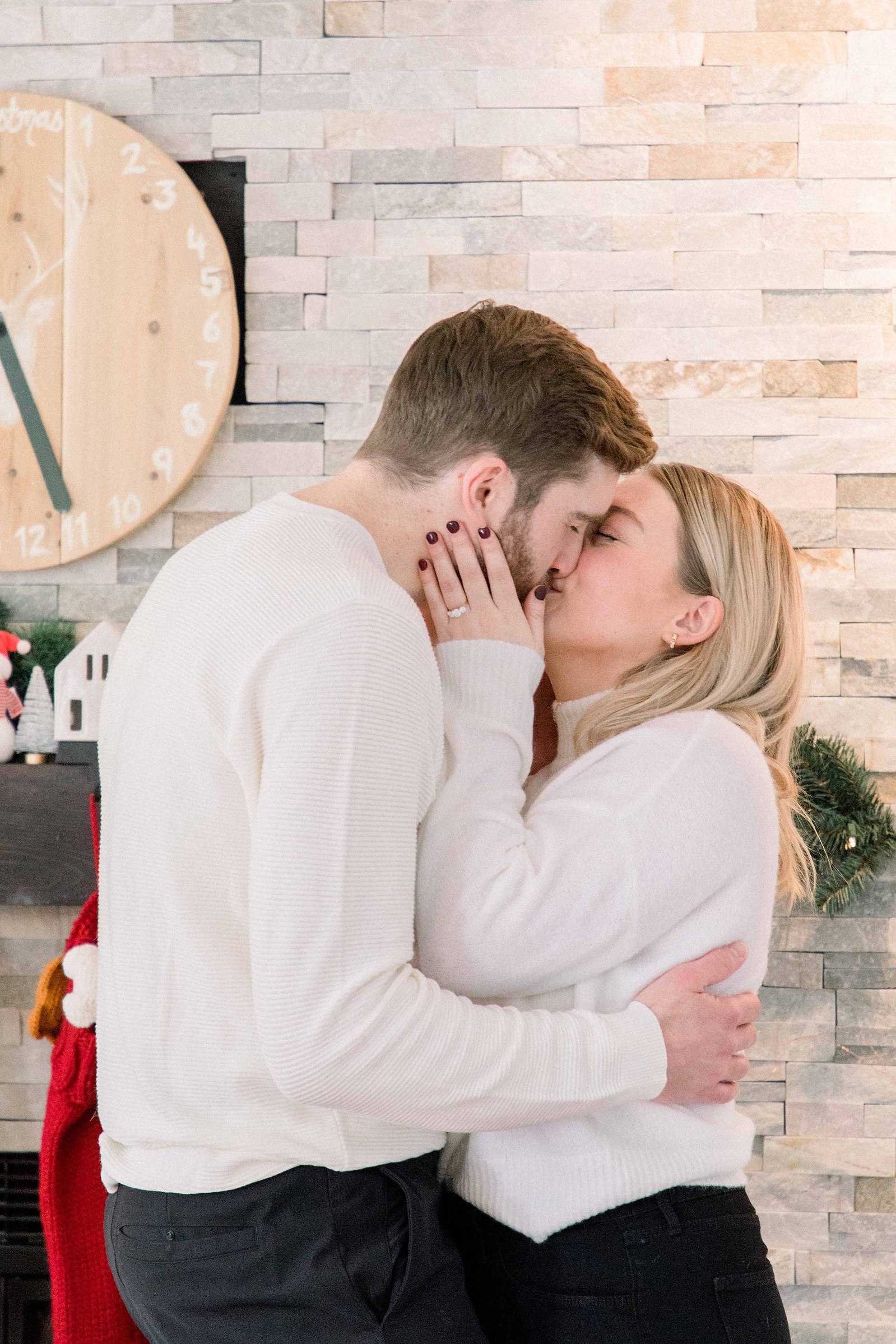 Cozy portrait of male & female couple inside their home. Surprise Proposal. Proposing. Christmas Photos. Ottawa Photographer. Vankleek Hill Photographer. Champlain Photographer. Emily VanderBeek Photography. Candid photography.