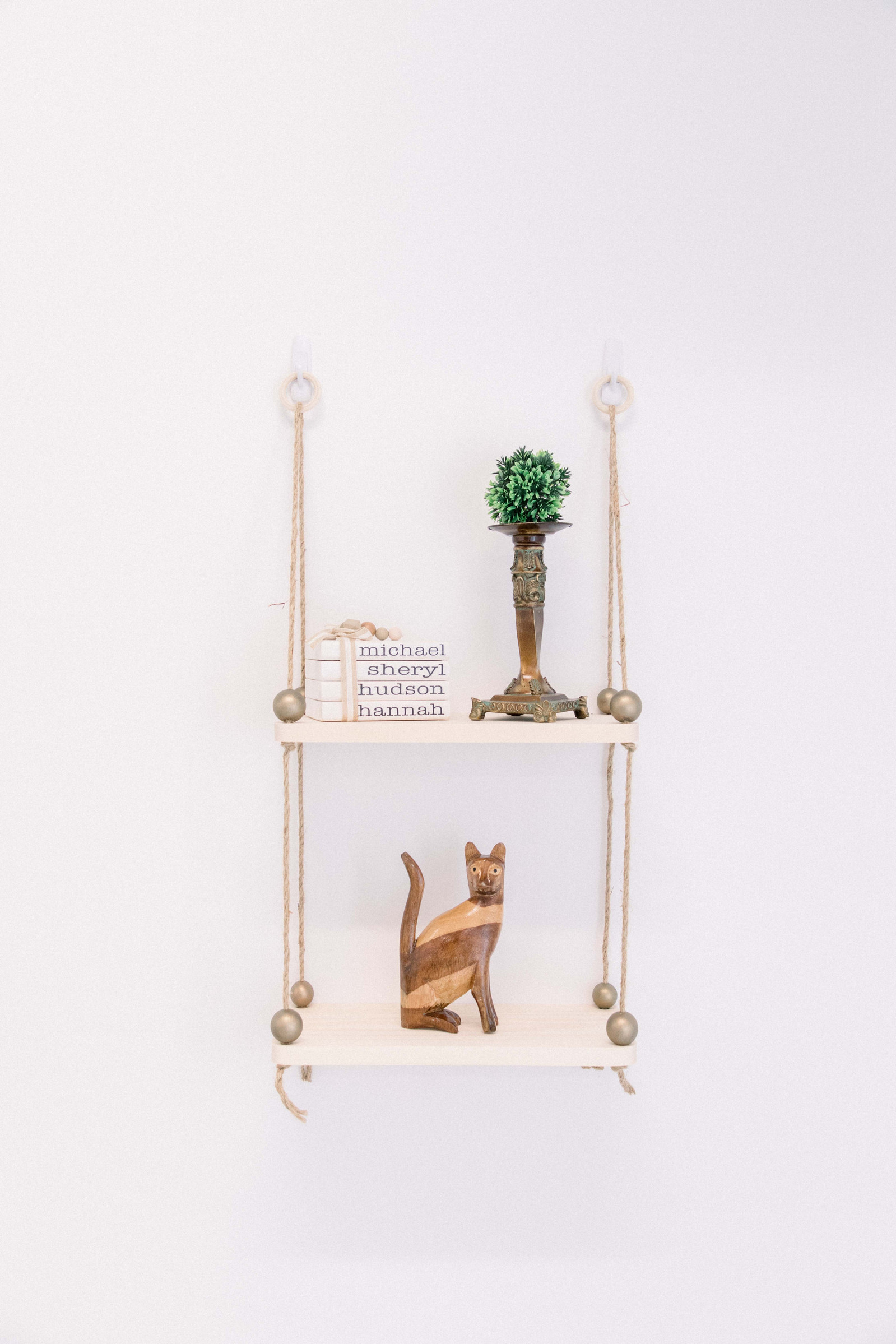 Product photo of handmade wooden shelf with items sitting on it. Emily VanderBeek Photography, branding photography, portrait photography, Niagara portrait photographer, Niagara branding photographer.