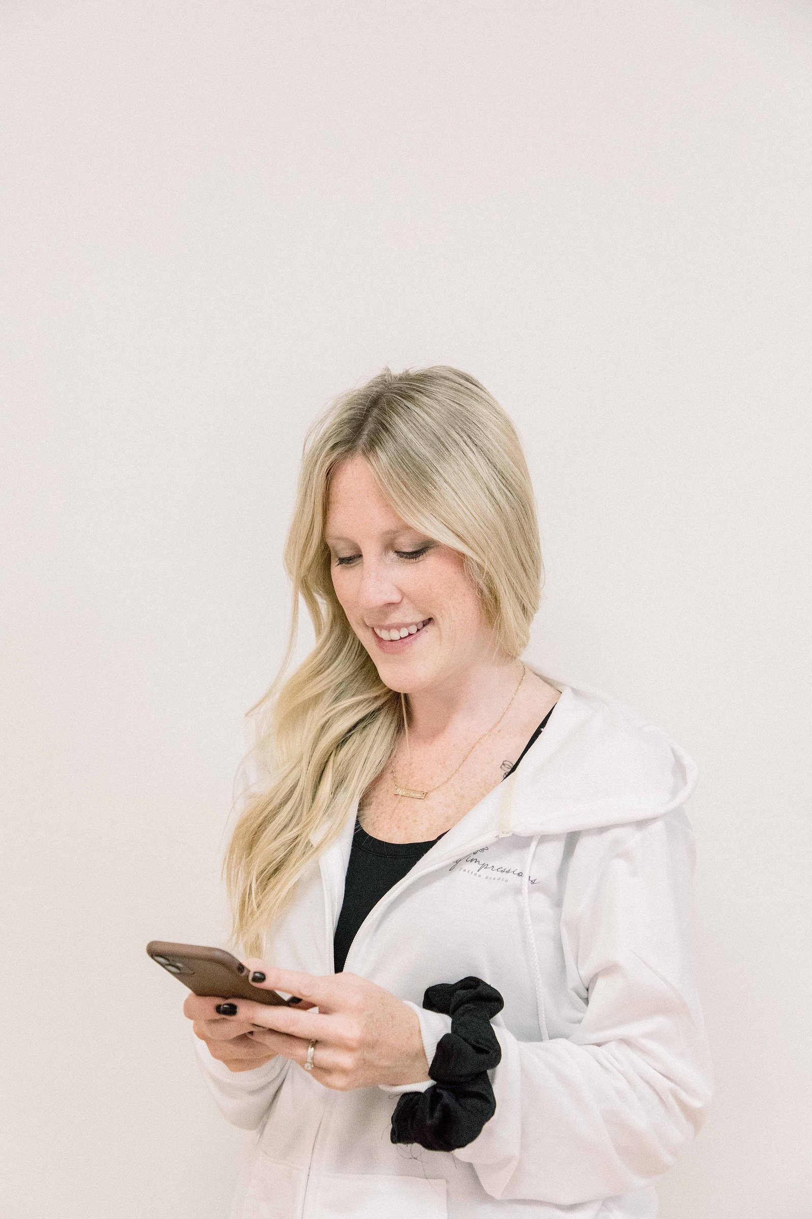 Business owner in a studio in Grimsby. Niagara Photographer. Tattoo Artist. Portrait Photography, Branding Photography, Light & Airy Photography. Emily VanderBeek Photography. Emily VanderBeek Photo.