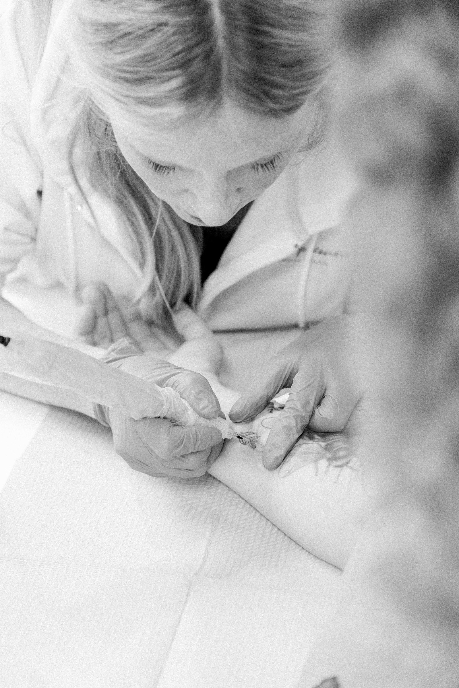 Business owner in a studio in Grimsby. Niagara Photographer. Tattoo Artist. Portrait Photography, Branding Photography, Light & Airy Photography. Emily VanderBeek Photography. Emily VanderBeek Photo.