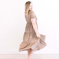 Candid portrait of woman in studio twirling around in long dress, Emily VanderBeek Photography, Portrait and Family photography, Niagara Photographer, Champlain Photographer, Vaudreuil-Soulanges Photographer, candid photography, authentic photography.