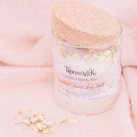 Stylized product photo of bath salts on a pink background, Emily VanderBeek Photography, Portrait and Family photography, Niagara Photographer, Champlain Photographer, Vaudreuil-Soulanges Photographer, candid photography, authentic photography.