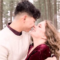 Candid portrait of man touching noses with woman on a winter trail, Emily VanderBeek Photography, Portrait and Family photography, Niagara Photographer, Champlain Photographer, Vaudreuil-Soulanges Photographer, candid photography, authentic photography.