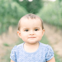 Candid portrait of little girl in a vineyard, Emily VanderBeek Photography, Portrait and Family photography, Niagara Photographer, Champlain Photographer, Vaudreuil-Soulanges Photographer, candid photography, authentic photography.