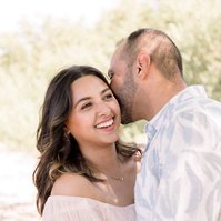 Portrait of husband kissing wife on the cheek. Emily VanderBeek Photography, Portrait and Family photography, Niagara Photographer, Champlain Photographer, Vaudreuil-Soulanges Photographer, candid photography, authentic photography.