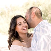Portrait of husband kissing wife on the cheek. Emily VanderBeek Photography, Portrait and Family photography, Niagara Photographer, Champlain Photographer, Vaudreuil-Soulanges Photographer, candid photography, authentic photography.