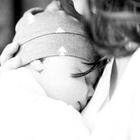 Black and white photo of mother holding baby boy, Emily VanderBeek Photography, Portrait and Family photography, Niagara Photographer, Champlain Photographer, Vaudreuil-Soulanges Photographer, candid photography, authentic photography.