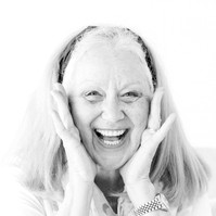 Black and white candid portrait of woman in studio laughing, Emily VanderBeek Photography, Portrait and Family photography, Niagara Photographer, Champlain Photographer, Vaudreuil-Soulanges Photographer, candid photography, authentic photography.