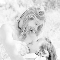 Black and white portrait of mother looking at daughter hugging her, Emily VanderBeek Photography, Portrait and Family photography, Niagara Photographer, Champlain Photographer, Vaudreuil-Soulanges Photographer, candid photography, authentic photography.