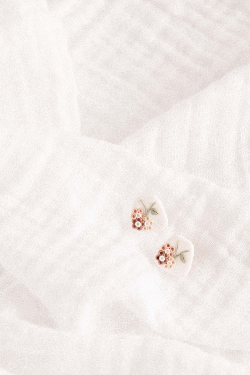 Stylized product photo of handmade earrings, Emily VanderBeek Photography, Portrait and Family photography, Niagara Photographer, Champlain Photographer, Vaudreuil-Soulanges Photographer, candid photography, authentic photography.
