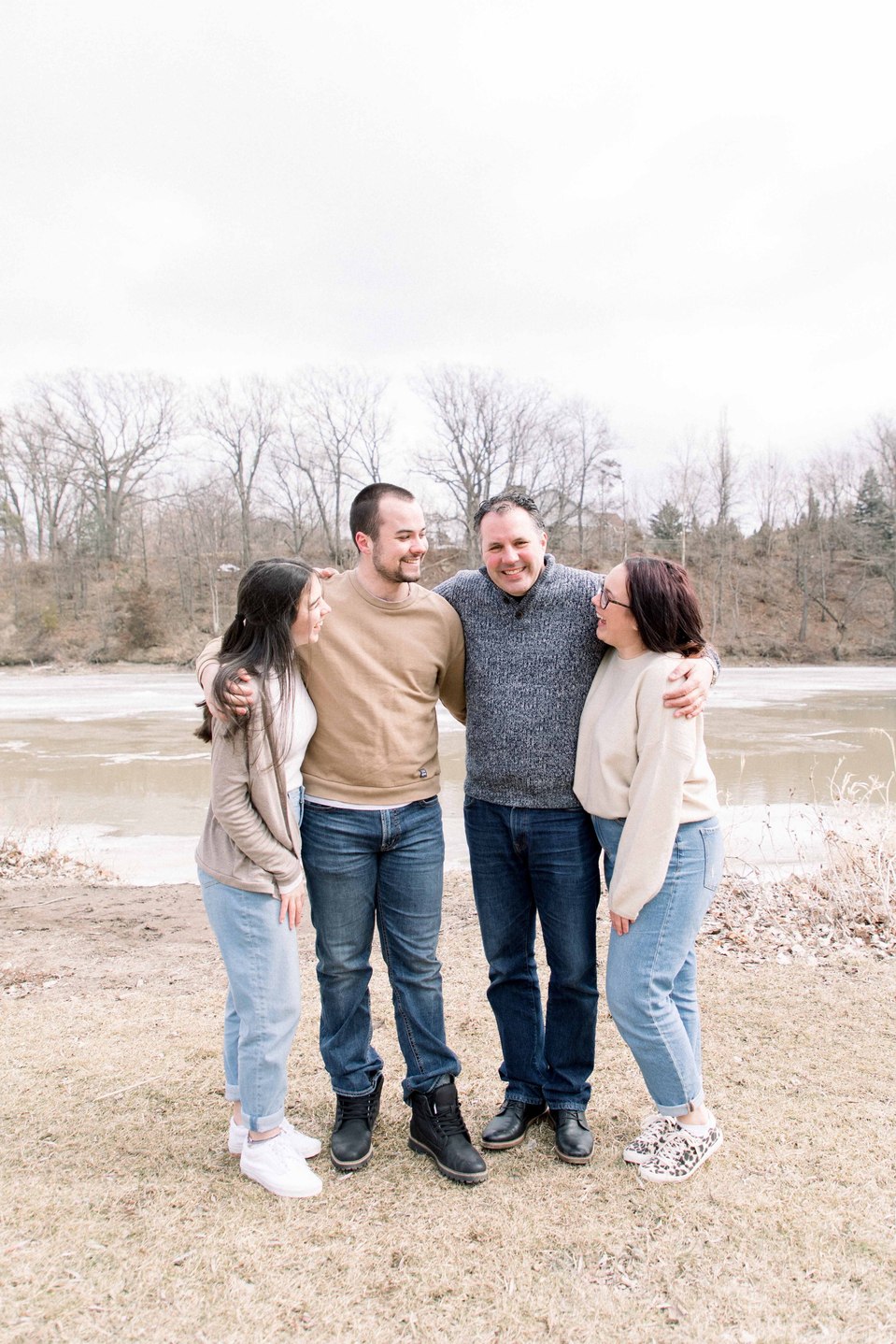 Family photo of dad, two daughters, and son by the water, Niagara family photographer, family photography, Niagara portrait photographer, portrait photography, Emily VanderBeek Photography.