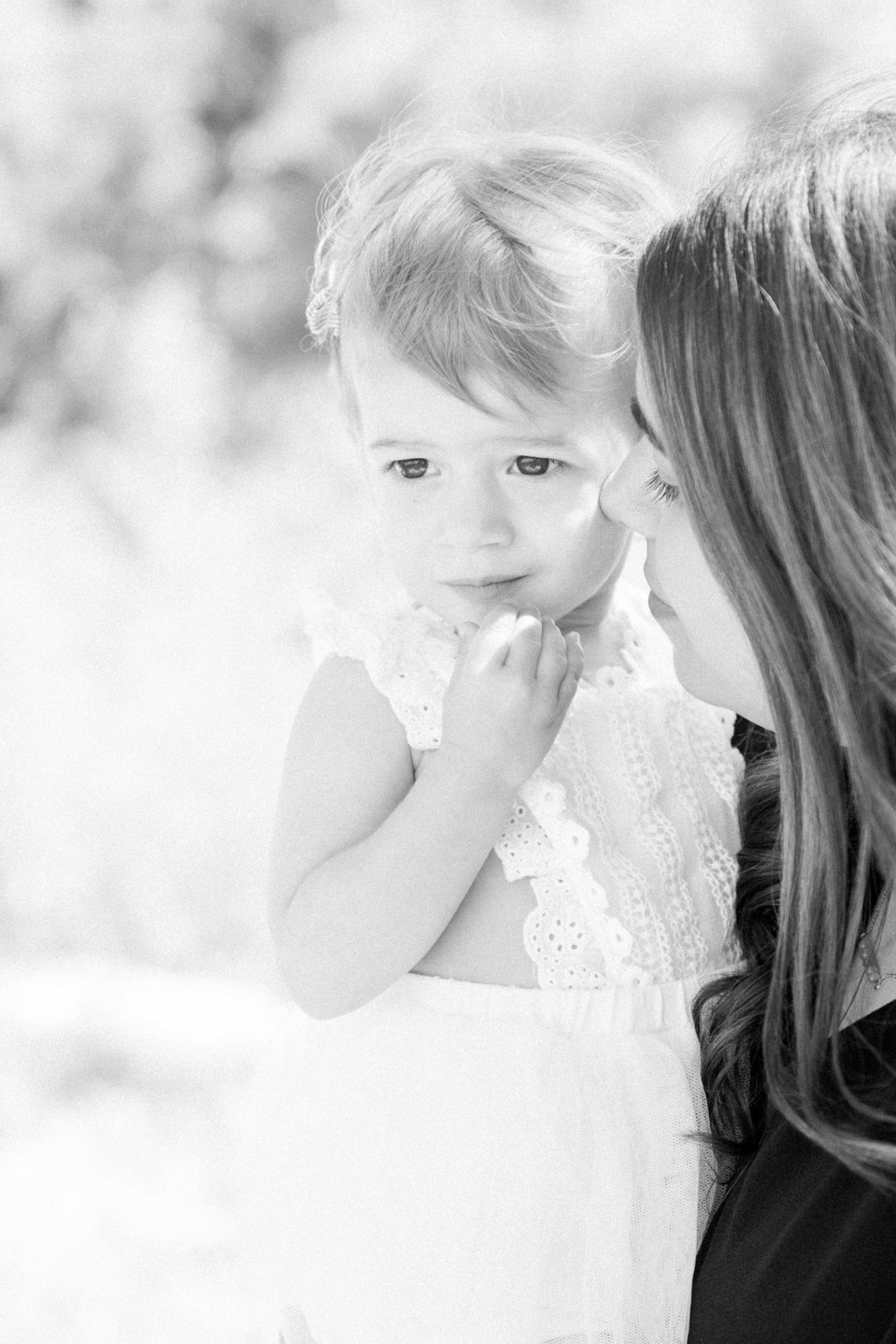 Black and white portrait of mother and daughter on the beach, Niagara portrait photographer, Niagara family photographer, portrait photography, family photography, candid photography, authentic photography, Emily VanderBeek Photography.